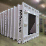 関東地方にある大手電機メーカー様の築50年の工場にシェルターをご納品